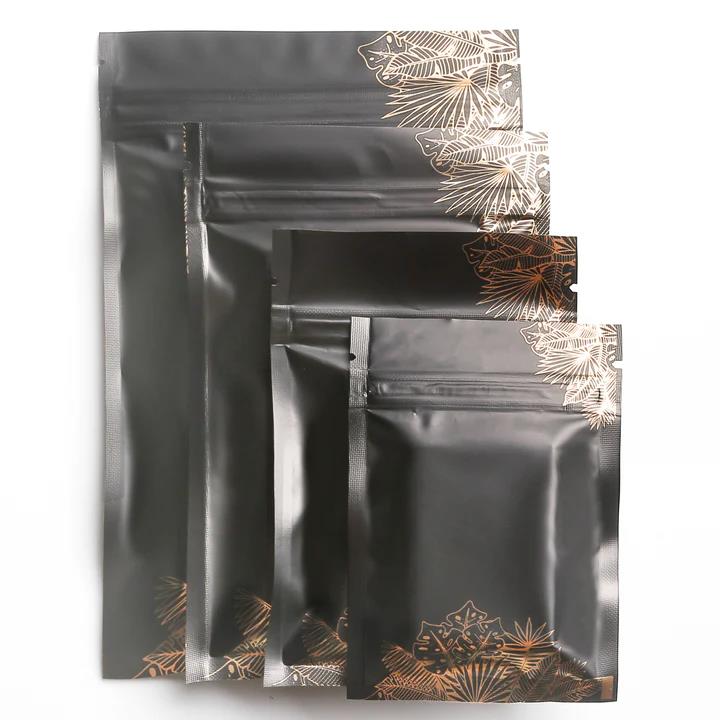 BORSE CON CERNIERA MYLAR IN ALLUMINIO STAMPATE FLOREALI PER VENDITA AL DETTAGLIO/CONFEZIONE REGALO 100 PZ - Foto 5 di 39