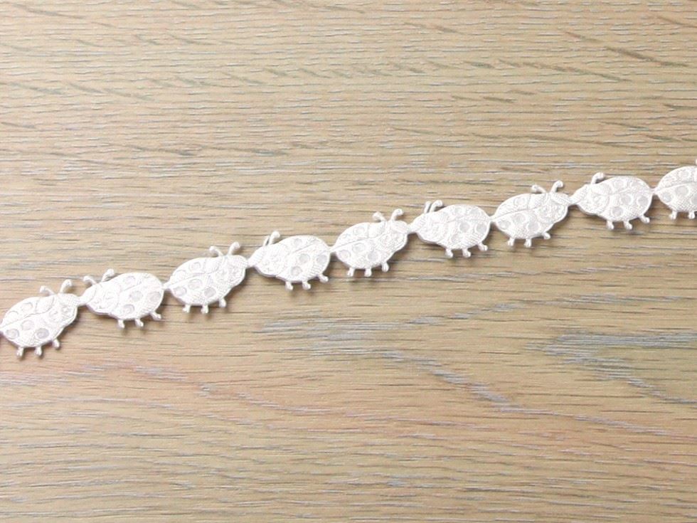 Ladybird Shaped Trim White
 