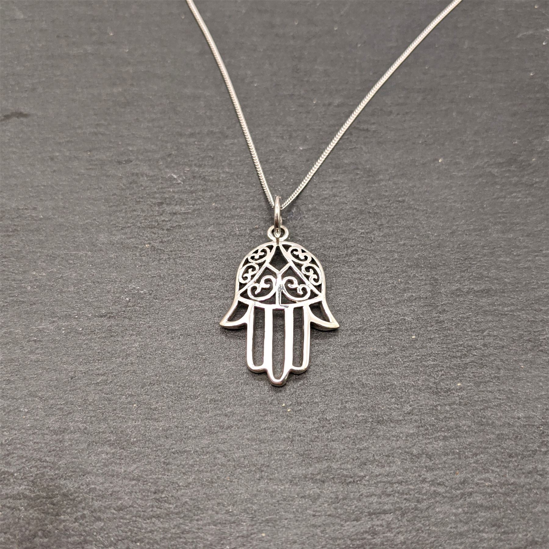 Confezione di orecchini a bottone con piccola mano di Hamsa in argento sterling e oro - Italia