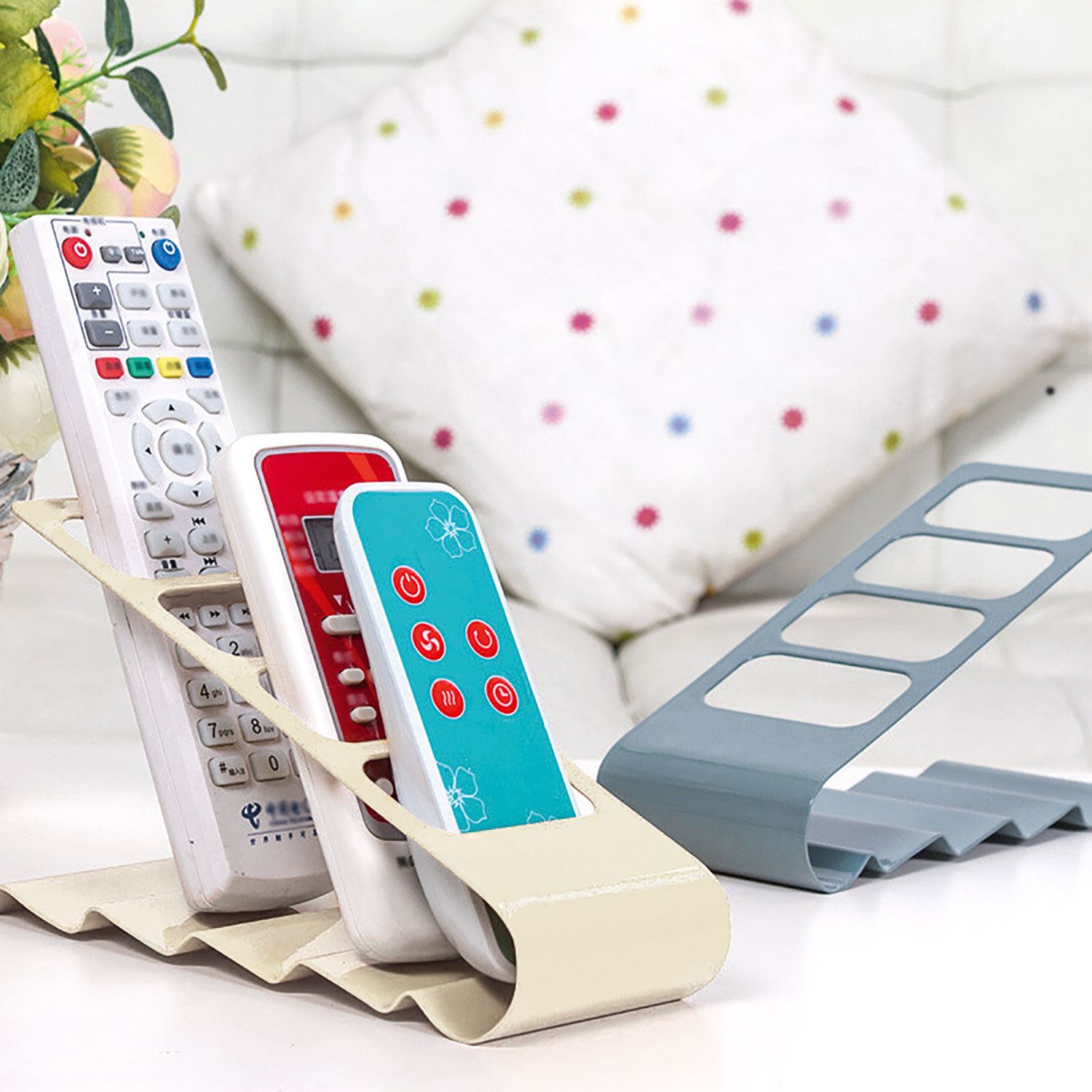 TV Plastic 4 STEP REMOTE CONTROL HOLDER STORAGE TIDY STAND ORGANISER RACK. TV Plastic 4 STEP REMOTE CONTROL HOLDER STORAGE TIDY STAND ORGANISER RACK.