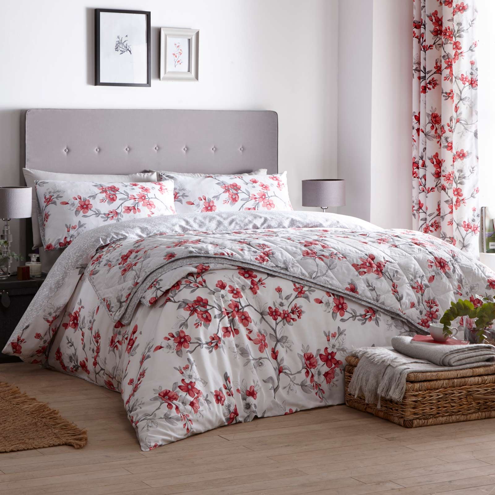 These suki duvet covers are available featuring an all over red mayflower pattern on a solid background the reverse of the bedding has