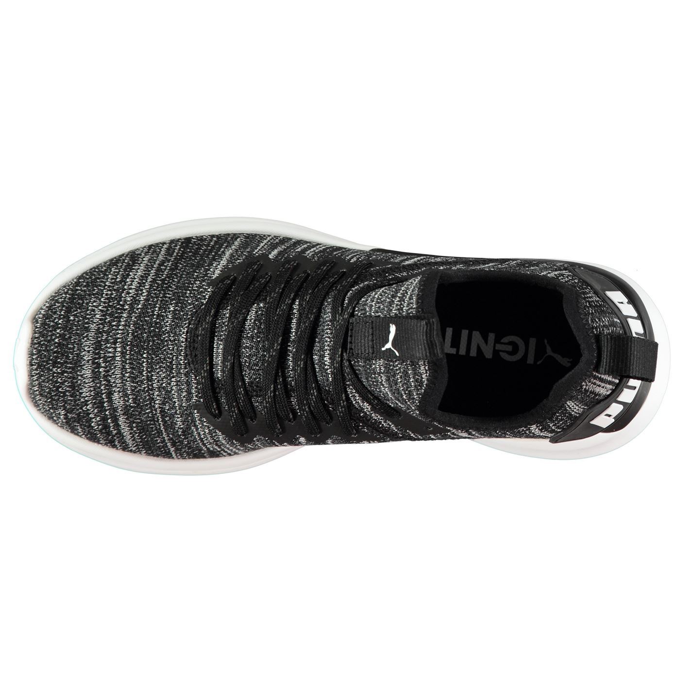 zapatillas puma negras y blancas