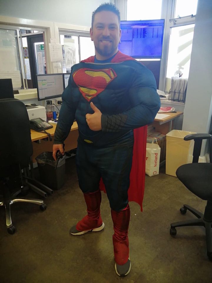 Photo of a morebus driver dressed as Superman