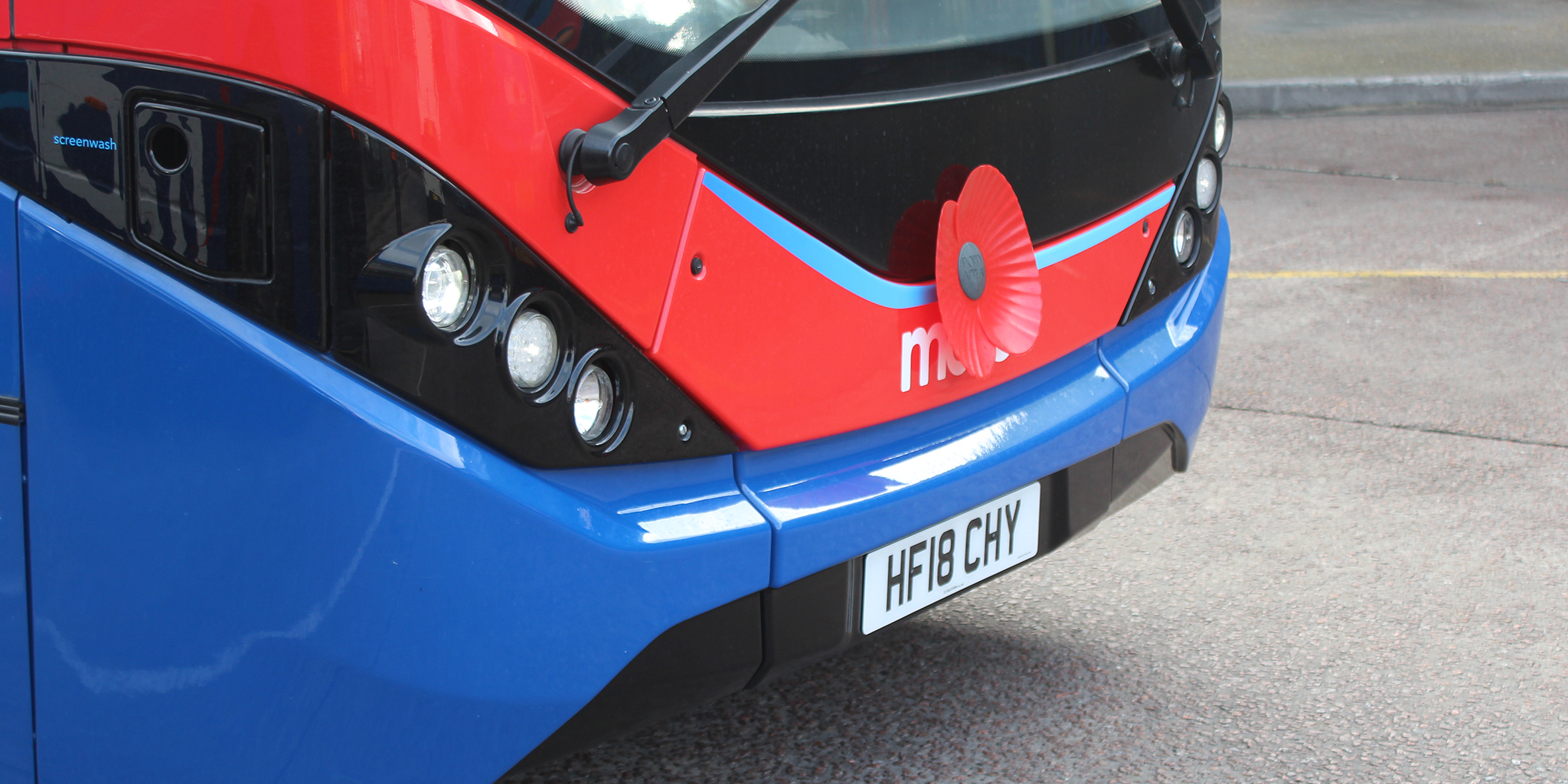 Photograph of a morebus sporting a remembrance poppy