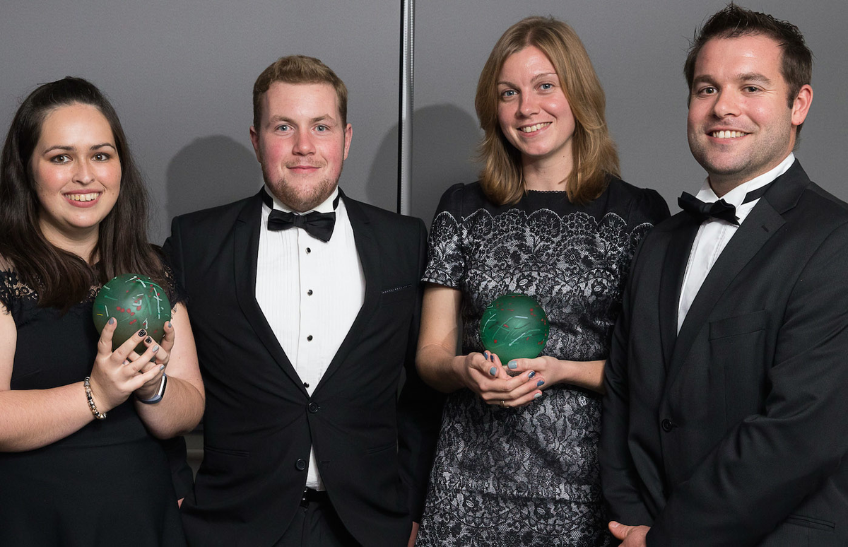 The team at Noah's Ark accepts two gold awards.