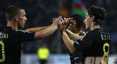 אוזיל ופודולסקי (GettyImages)