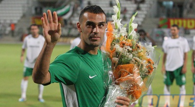 וויאם עמאשה עם הפרחים (עמית מצפה)