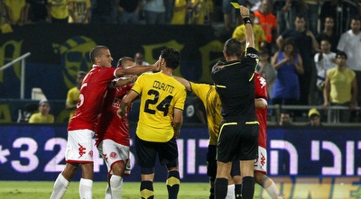 ידין וקולאוטי מתעמתים (יוסי ציפקיס)