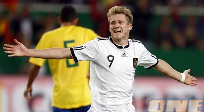 אנדרה שואלה חוגג (רויטרס)