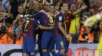 שחקני ברצלונה חוגגים (רויטרס) שחקני ברצלונה חוגגים (רויטרס)