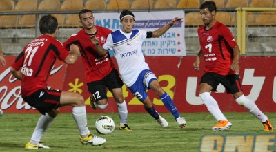 רוצ&acute;ט מלהטט בין שחקני חיפה (עמית מצפה)