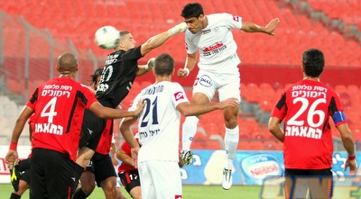 תומר אלבז נוגח (משה חרמון)