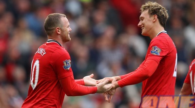 רוני וג´ונס מבסוטים. היו להם 8 סיבות טובות (GettyImages)