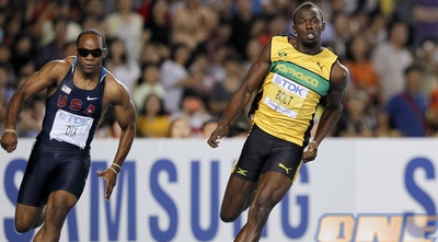 בולט מקדים את וולטר דיקס (רויטרס) בולט מקדים את וולטר דיקס (רויטרס)