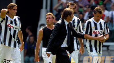 אנטוניו קונטה עם שחקניו. &qout; (GettyImages)