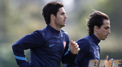 יוסי בניון ומיקל ארטטה (רויטרס)