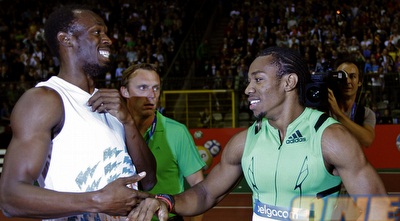 בולט מגיע לברך את בלייק (רויטרס) בולט מגיע לברך את בלייק (רויטרס)