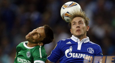 בוקולי רק רוצה להניח את הראש על הכתף של הולטבי (רויטרס)