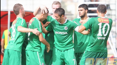 שחקני מכבי חיפה חוגגים (משה חרמון) שחקני מכבי חיפה חוגגים (משה חרמון)