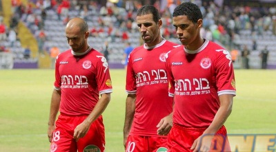 פרנסמן, באדיר ואבוטבול. ביקורת על החלק האחורי (משה חרמון)