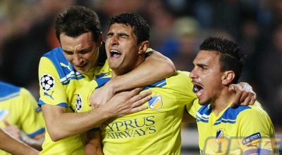 שחקני אפואל חוגגים ניצחון דרמטי על פורטו(רויטרס)