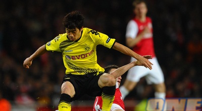 שינג´י קגאווה משאיר את לורן קוסיילני מאחור (GettyImages)