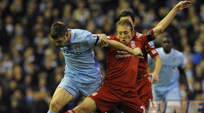 לוקאס מול מילנר בקרב על הכדור (רויטרס) לוקאס מול מילנר בקרב על הכדור (רויטרס)