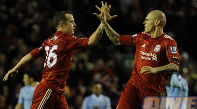 אדם וסקרטל חוגגים את השער (רויטרס) אדם וסקרטל חוגגים את השער (רויטרס)