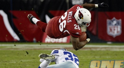 בן וולס מהקרדינלס מדלג מעל אוריאנדו סקנדריק (רויטרס)