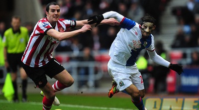 סיימון ווקצ´ביץ´ חולף על פני ג´ון אושה (GettyImages)