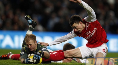 ג´ו הארט מקדים את לורן קוסיילני (רויטרס)