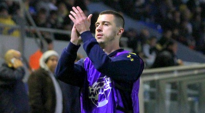 האריס מדוניאנין מגיב לקריאות הקהל (יניב גונן) האריס מדוניאנין מגיב לקריאות הקהל (יניב גונן)