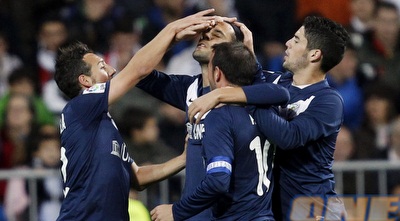 שחקני מלאגה חוגגים (רויטרס)