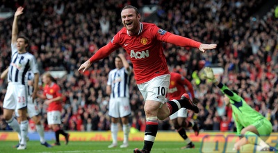 וויין רוני חוגג. תשעה שערים בשישה משחקים (GettyImages)