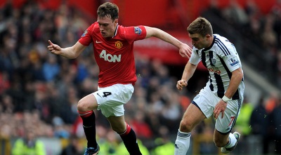 פיל ג´ונס מול ג´יימס מוריסון (GettyImages)