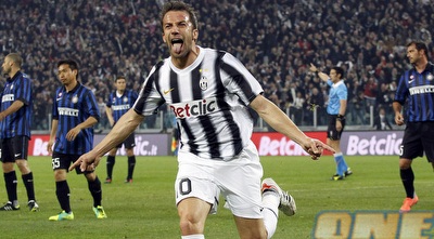 &qout;עד היום תלוי בבית הוריי פוסטר של אלכס&qout; (רויטרס)