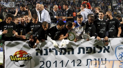 שחקני עירוני קריית שמונה חוגגים (יוסי ציפקיס)