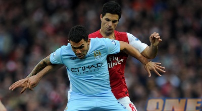 מיקל ארטטה מול קרלוס טבס (GettyImages) מיקל ארטטה מול קרלוס טבס (GettyImages)