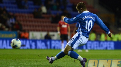 מאלוני כובש את ה-0:1 של וויגאן (GettyImages) מאלוני כובש את ה-0:1 של וויגאן (GettyImages)