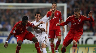 אלאבה ושוויינשטייגר עוצרים את די מריה (GettyImages)