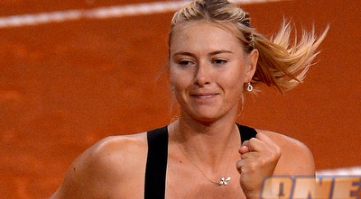 שראפובה חוגגת עלייה לגמר (GettyImages) שראפובה חוגגת עלייה לגמר (GettyImages)