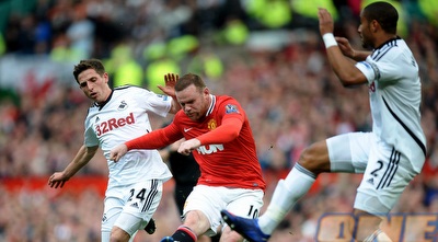 וויין רוני משחרר בעיטה (GettyImages)