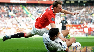 ניל טיילור עוצר את פיל ג´ונס (GettyImages)