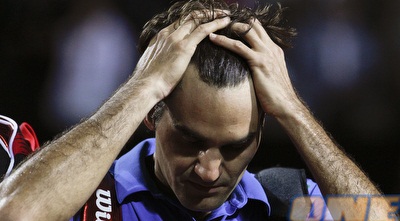 פדרר תופס את הראש. הקאמבק בסיום לא הספיק (רויטרס)