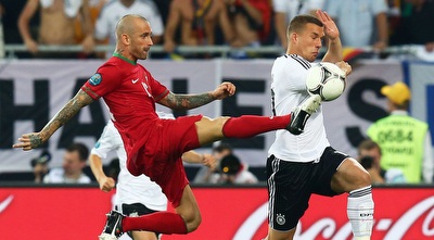 פודולסקי מול מיירלש (GettyImages) פודולסקי מול מיירלש (GettyImages)