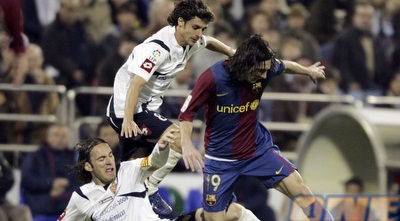 מיליטו מול מסי בימי סראגוסה (רויטרס)