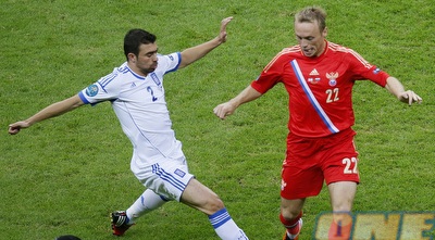 מניאטיס סוגר את גלושאקוב, הערב (רויטרס) מניאטיס סוגר את גלושאקוב, הערב (רויטרס)