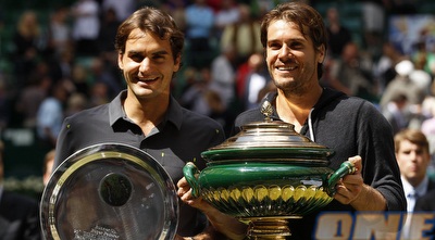 טומי האס ורוג´ר פדרר (רויטרס) טומי האס ורוג´ר פדרר (רויטרס)