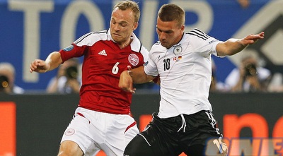 ג´קובסן שומר על פודולסקי (רויטרס)