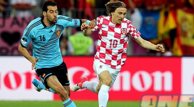 לוקה מודריץ´ מול סרחיו בוסקטס (GettyImages)